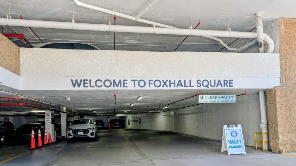 Covered parking garage at Foxhall Square operated by Colonial Parking with valet service available